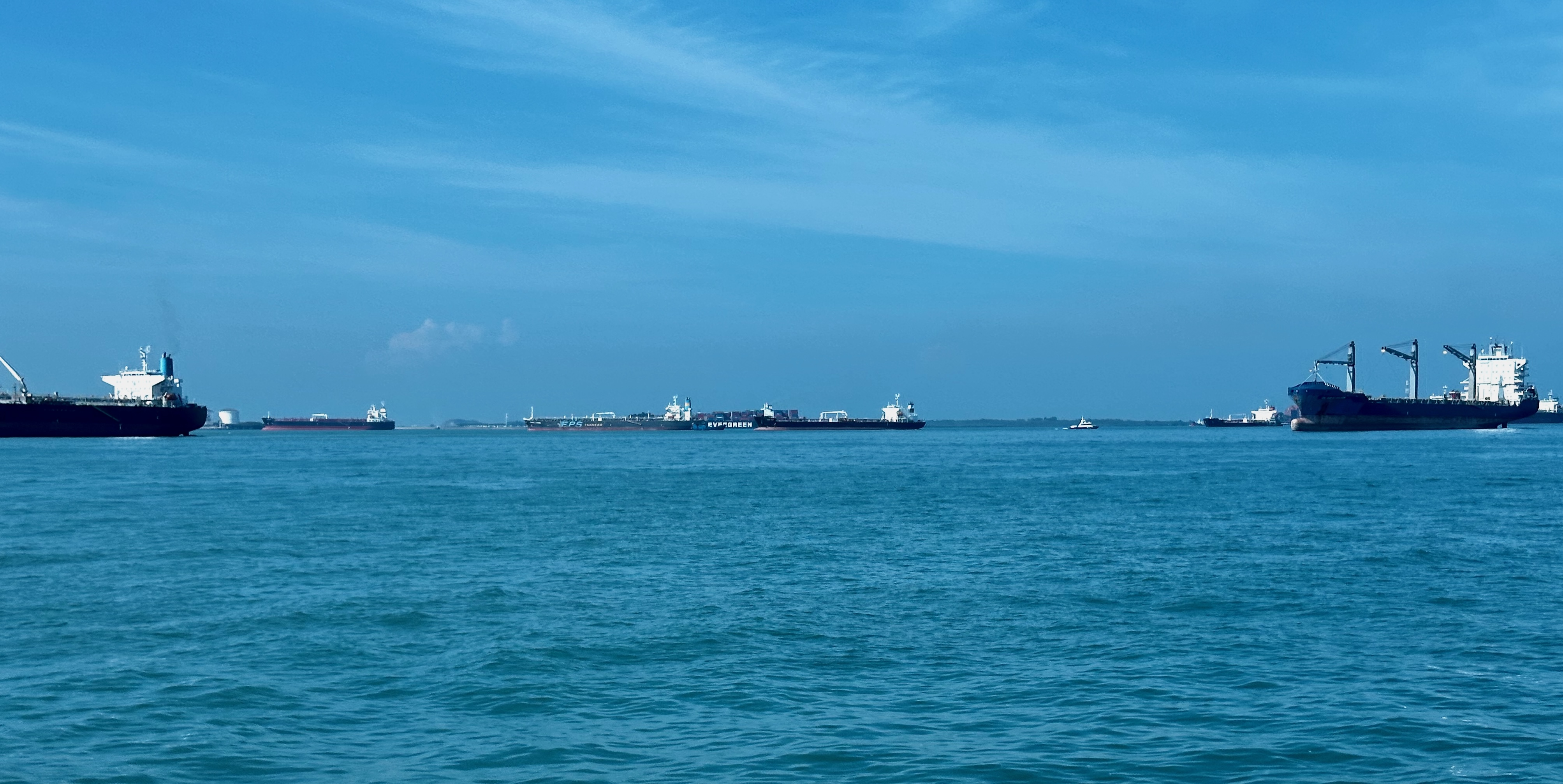 Ships idling offshore between Singapore and Batam, Indonesia