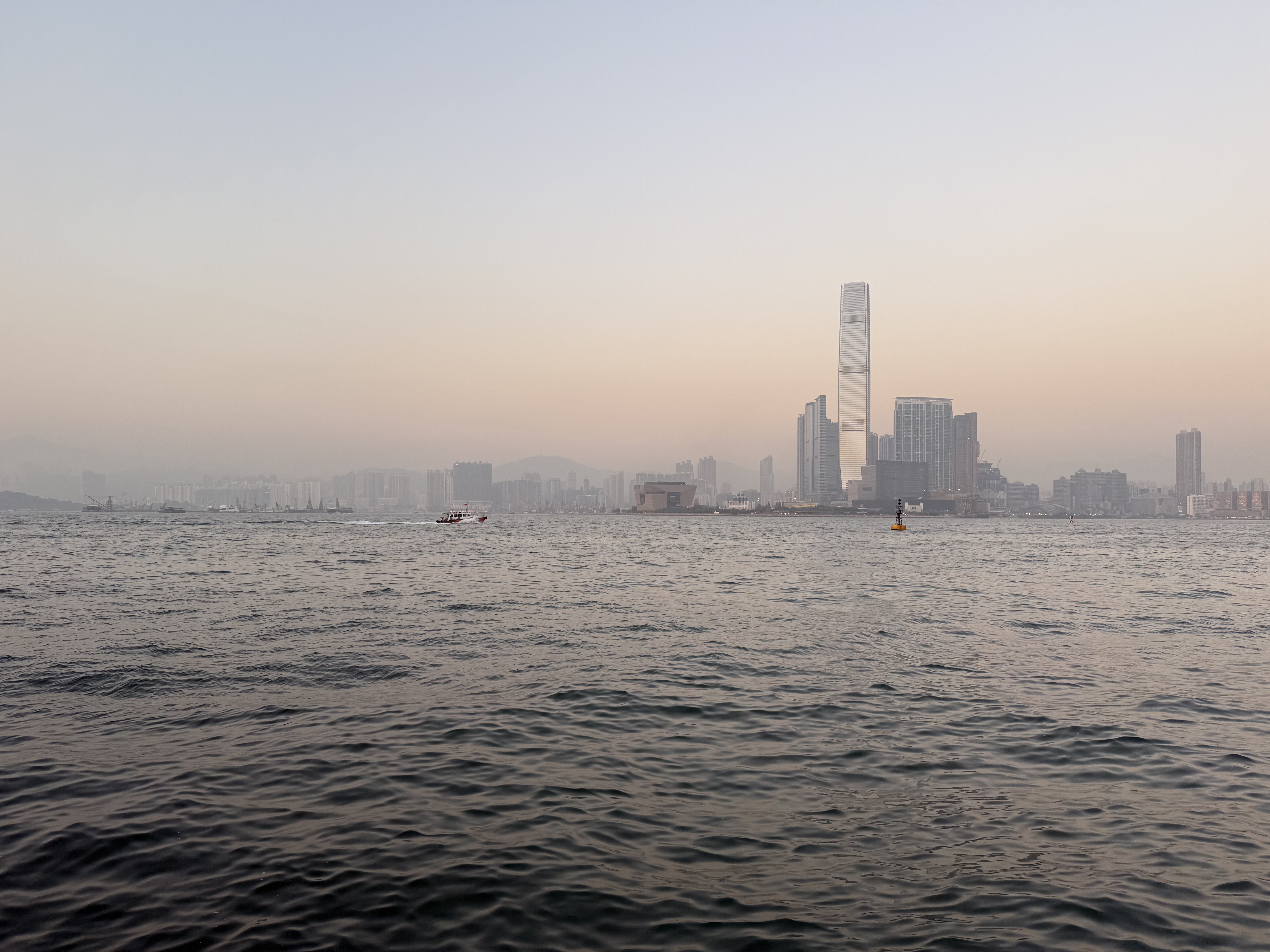 Looking towards Tsim Sha Tsui from the harbor front near Sheung Wan on one of the last days of the year